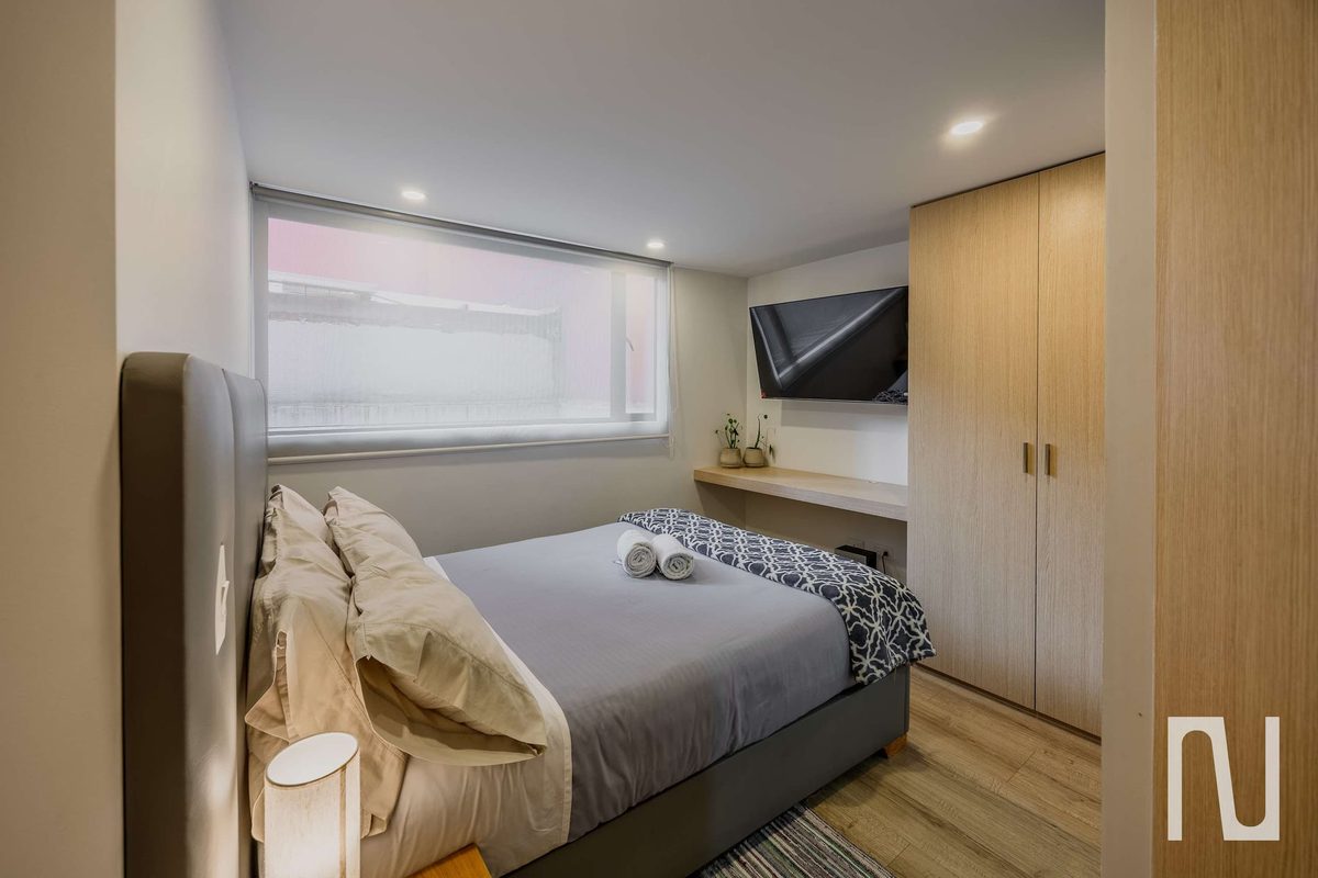 Bedroom 3 with bed and TV